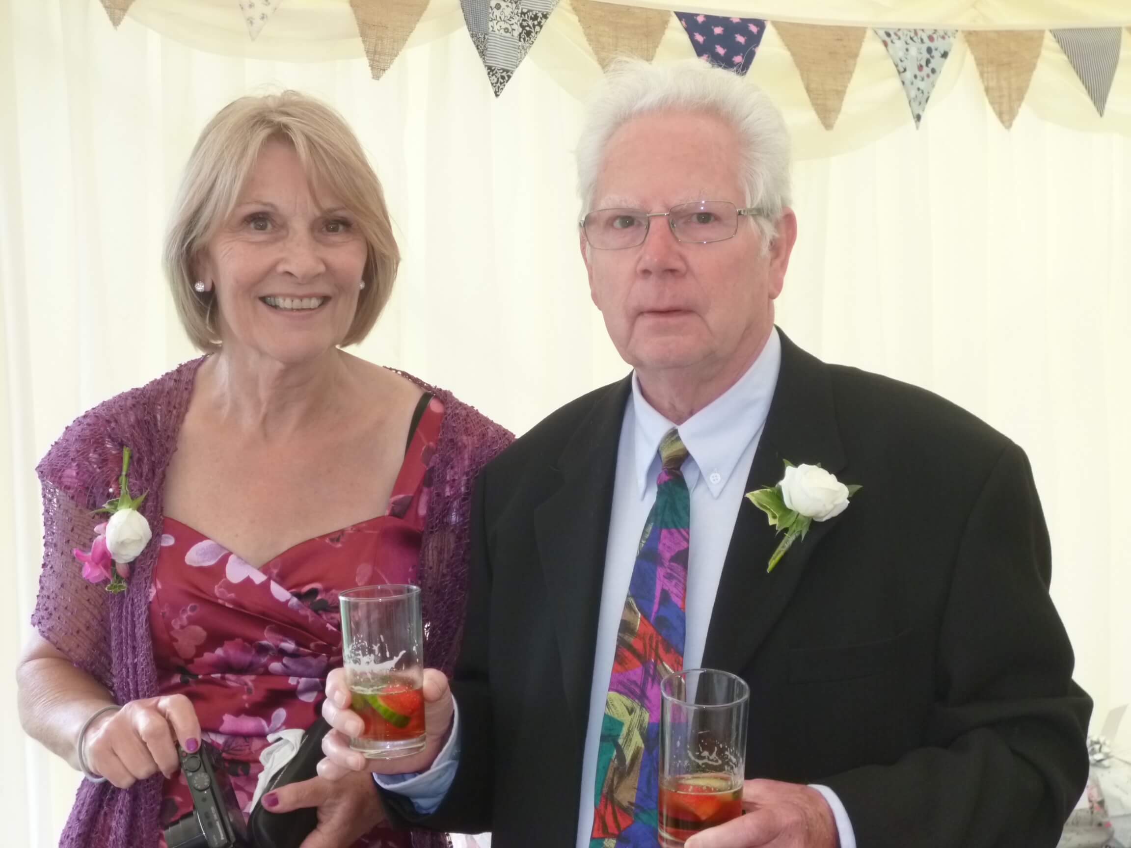 Lorna England at a wedding with her husband